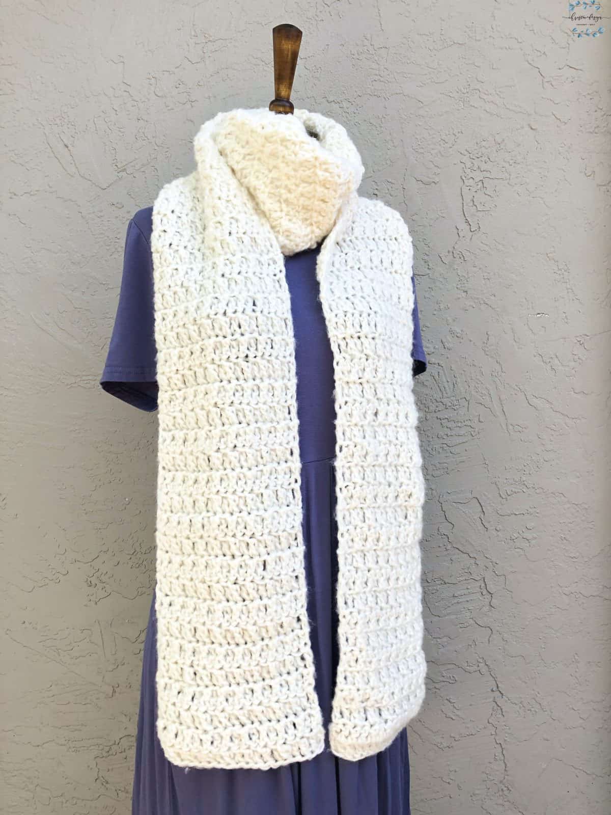 picture of chunky crochet scarf wrapped on mannequin