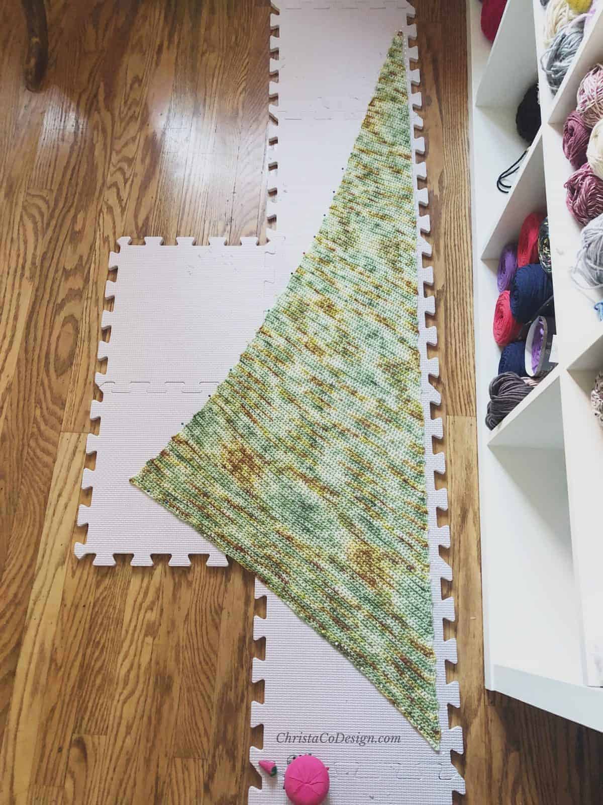 Picture of triangle scarf on blocking boards