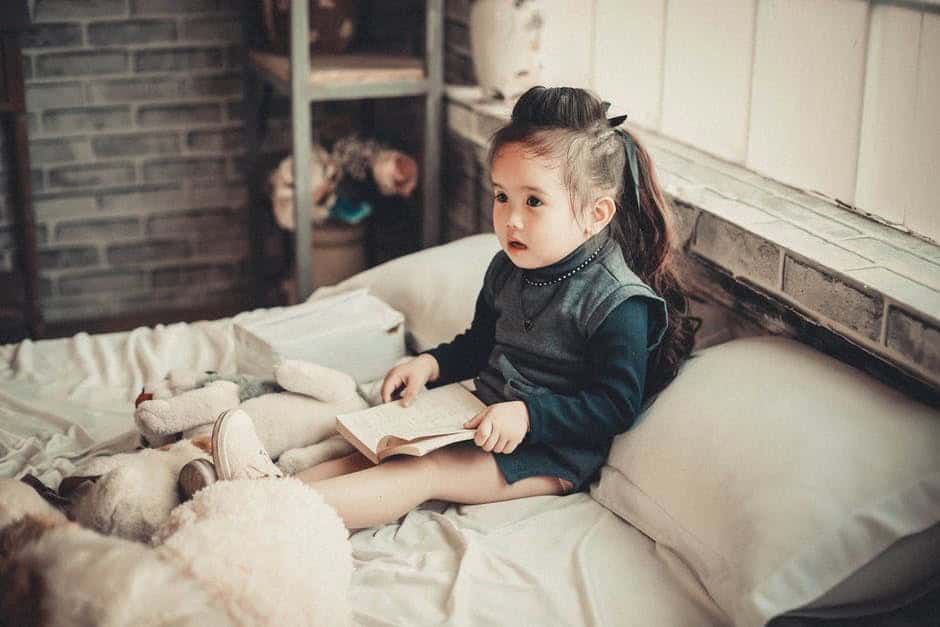 child on bed