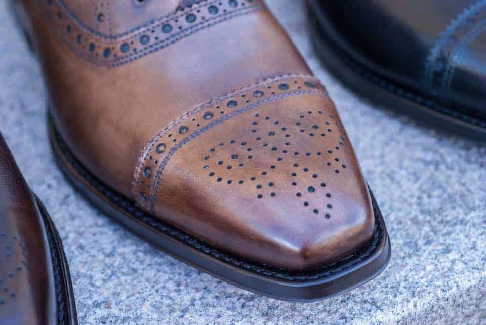 It's more or less impossible to separate a Blake/Rapid stitched shoe as this to a welted shoe when seen from the outside.