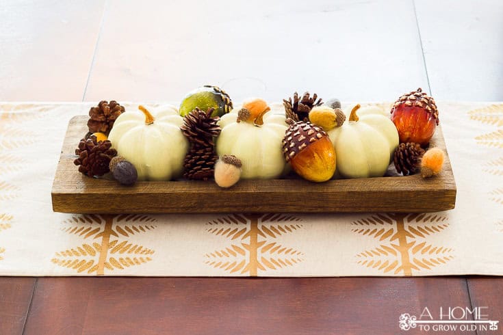 I love this simple fall centerpiece for the dining room! I can't get over how much great fall home decor inspiration there is here! Definitely pinning for later!