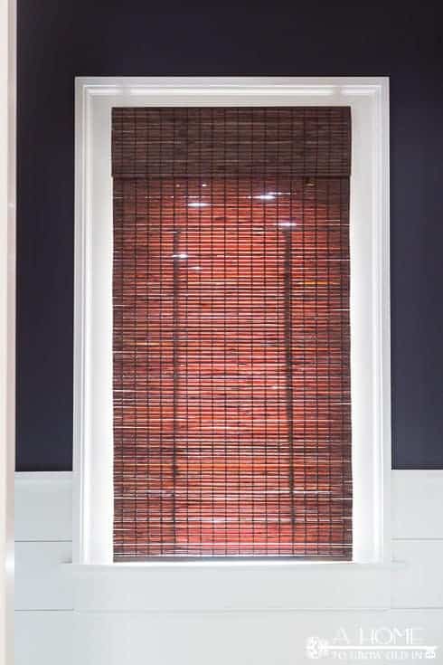 This is a great tutorial on where to buy an inexpensive bamboo shade for any size window and how to easily shorten them to get a custom made look. Pin it so you don't forget it!