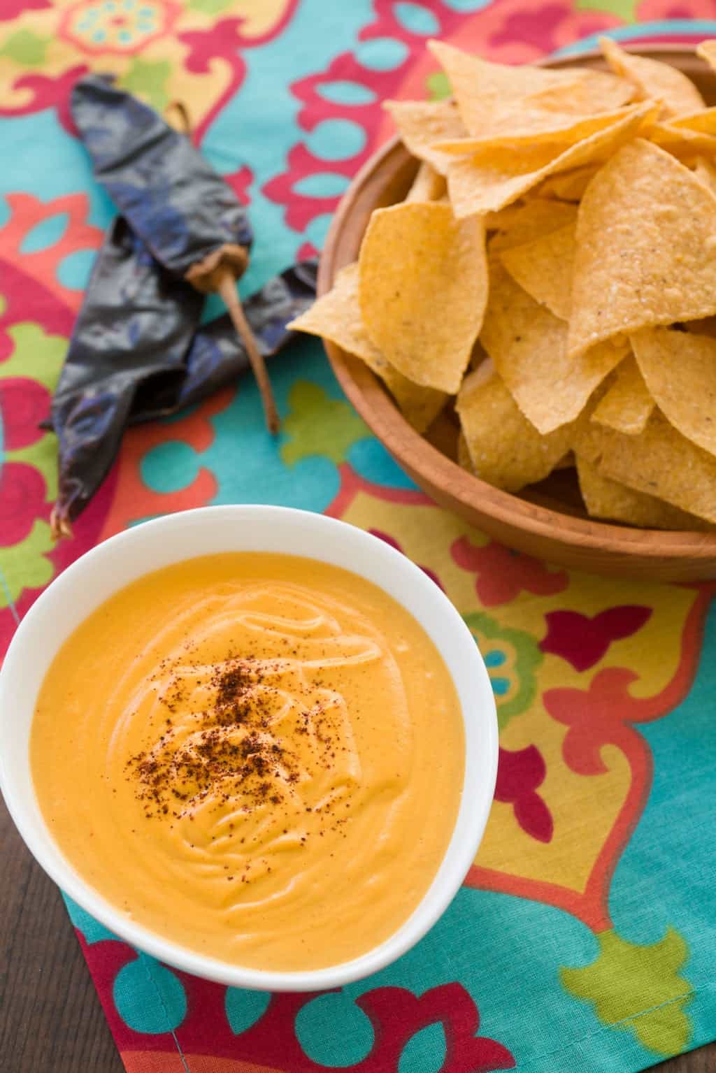 Vegan Chili Con Queso Recipe A delicious dipable, pourable, plant-based chili con queso that comes togehter in under 15 minutes.