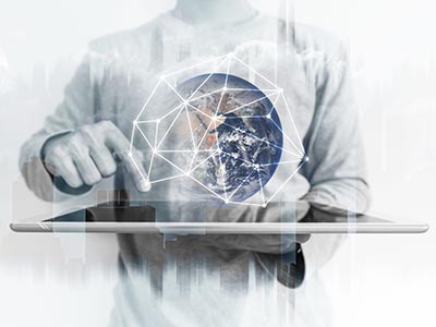Business Man Holding Tablet with Virtual World Covered by Umbrella of Connected Dots