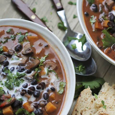 Chilli Black Bean Soup with Sweet Potatoes Mushrooms and Coconut - plant-based