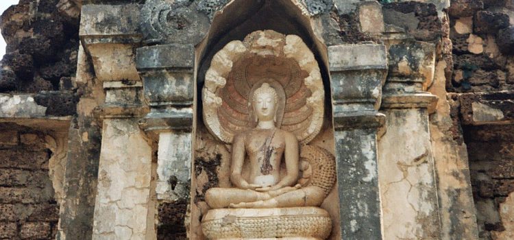 Buddha seated on naga at Si Satchanalai To Si Satchanalai historical park