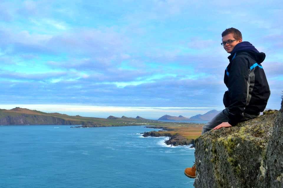 boy on edge of cliff ireland