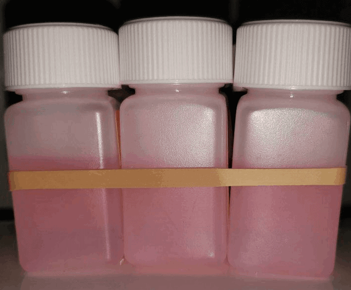 harm reduction methadone maintenance treatment -MMTP Picture shows 3 take-home bottles of methadone as a form of harm reduction and process of overcoming heroin addiction.