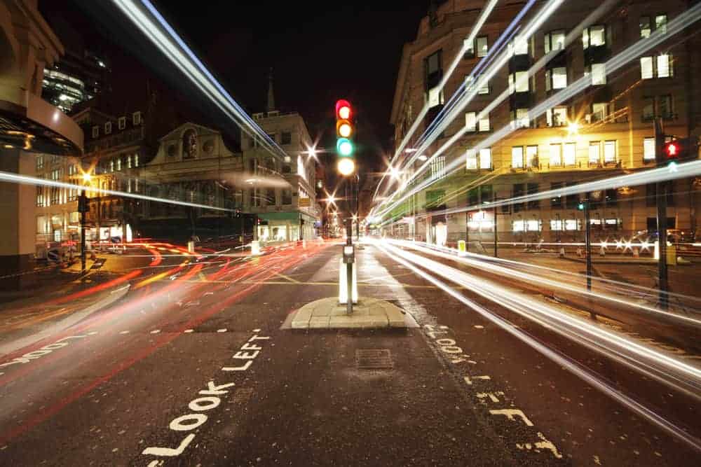 coping skill Stop Look Listen. A traffic light in the middle of the street in London is Red it signifies the coping skill Stop Look Listen.