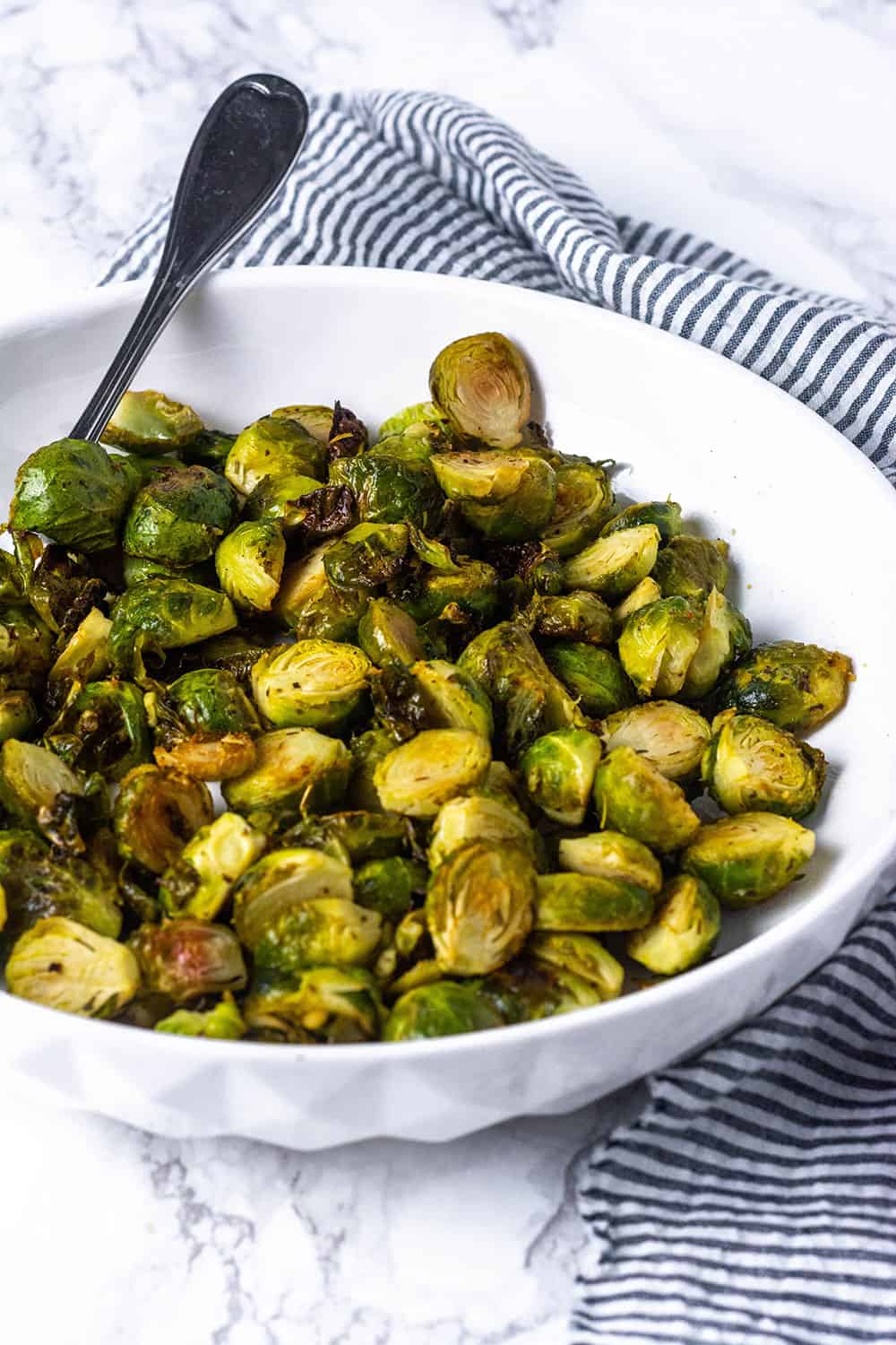 Easy Roasted Brussels Sprouts in a white bowl