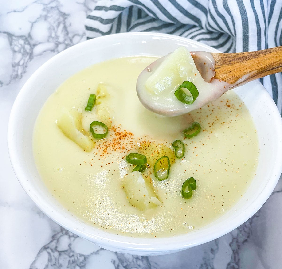 instant pot potato soup in a white bowl