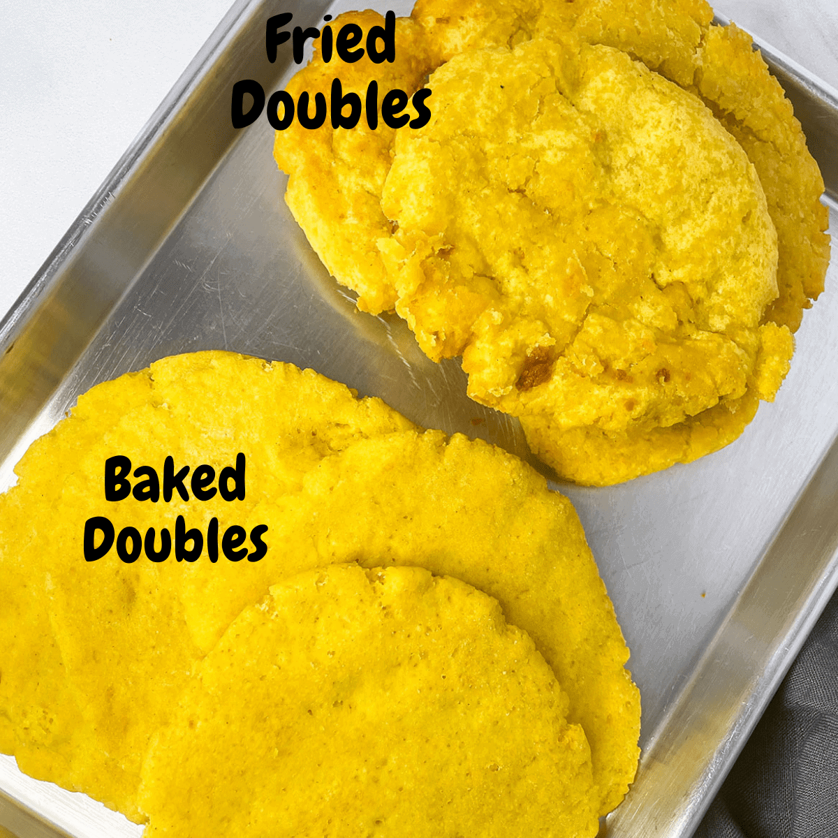 baking tray with fried and baked gluten-free doubles