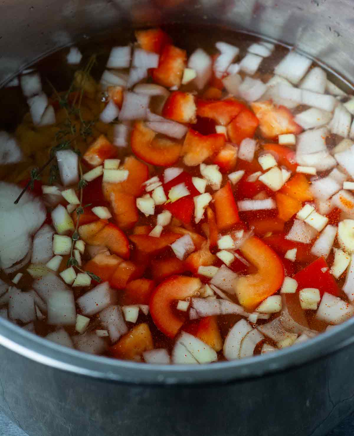 overlay chopped veggies and ingredients for Instant Pot lima bean