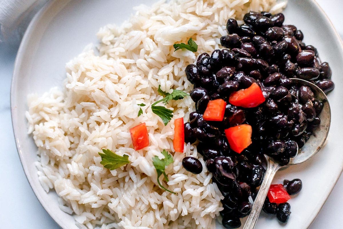 Close up nstant pot black bean in a white bowl on a cutting
