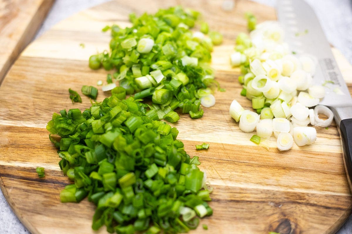 Green onion chopped on cutting board