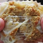Hands holding Welsh Rarebit Muffins