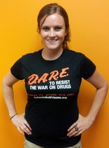 Associate Director, Stacia Cosner wearing one of our new DARE parody tshirts