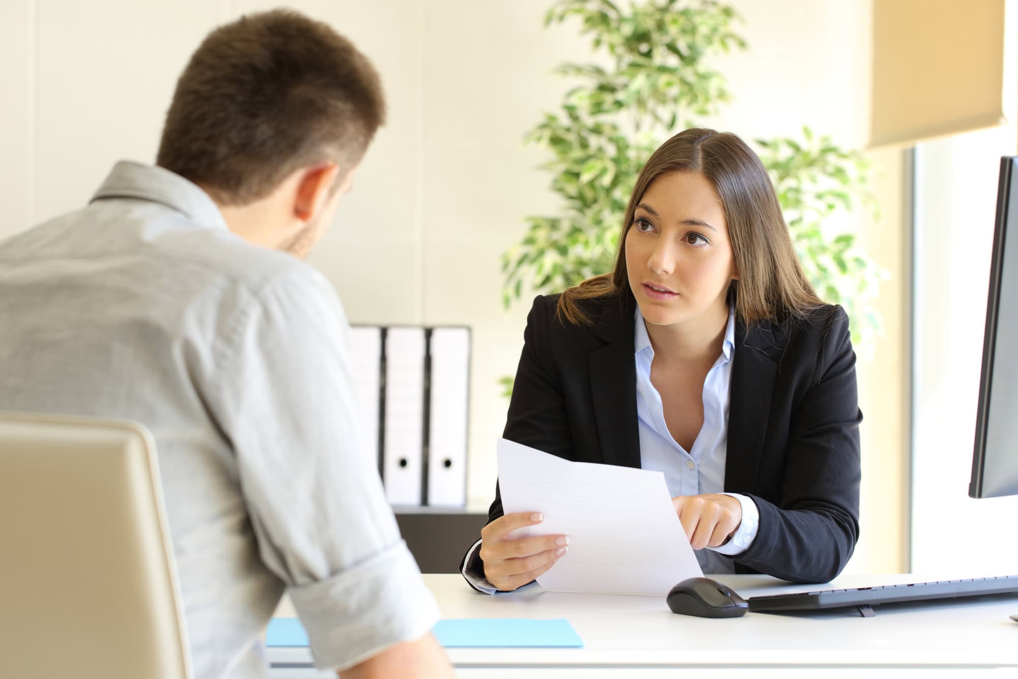 Man searching job during an interview Glassdoor Reviews Reputation Management