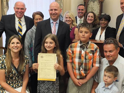Riley Maedler at the signing of Riley's Law