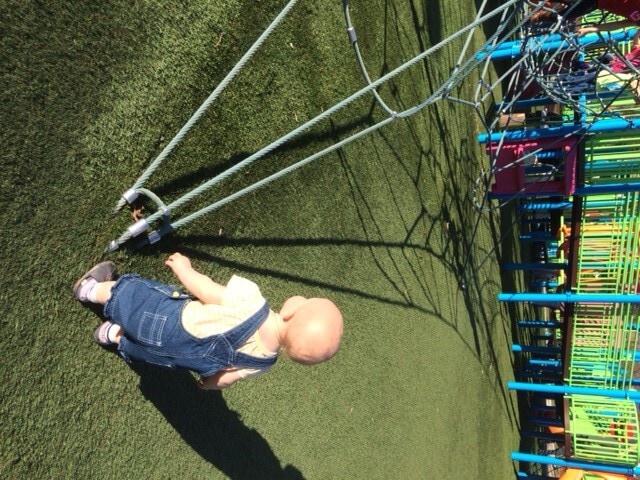 played at a cool playground where she discoved slides, aka the coolest thing ever, she could slide all day!