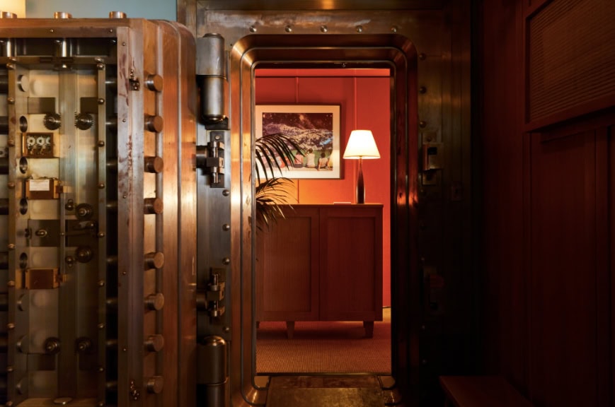 Open door of an old bank vault, which leads into the lobby of Hotel Kinsley's 301 Wall Street location. Based in Kingston NY.