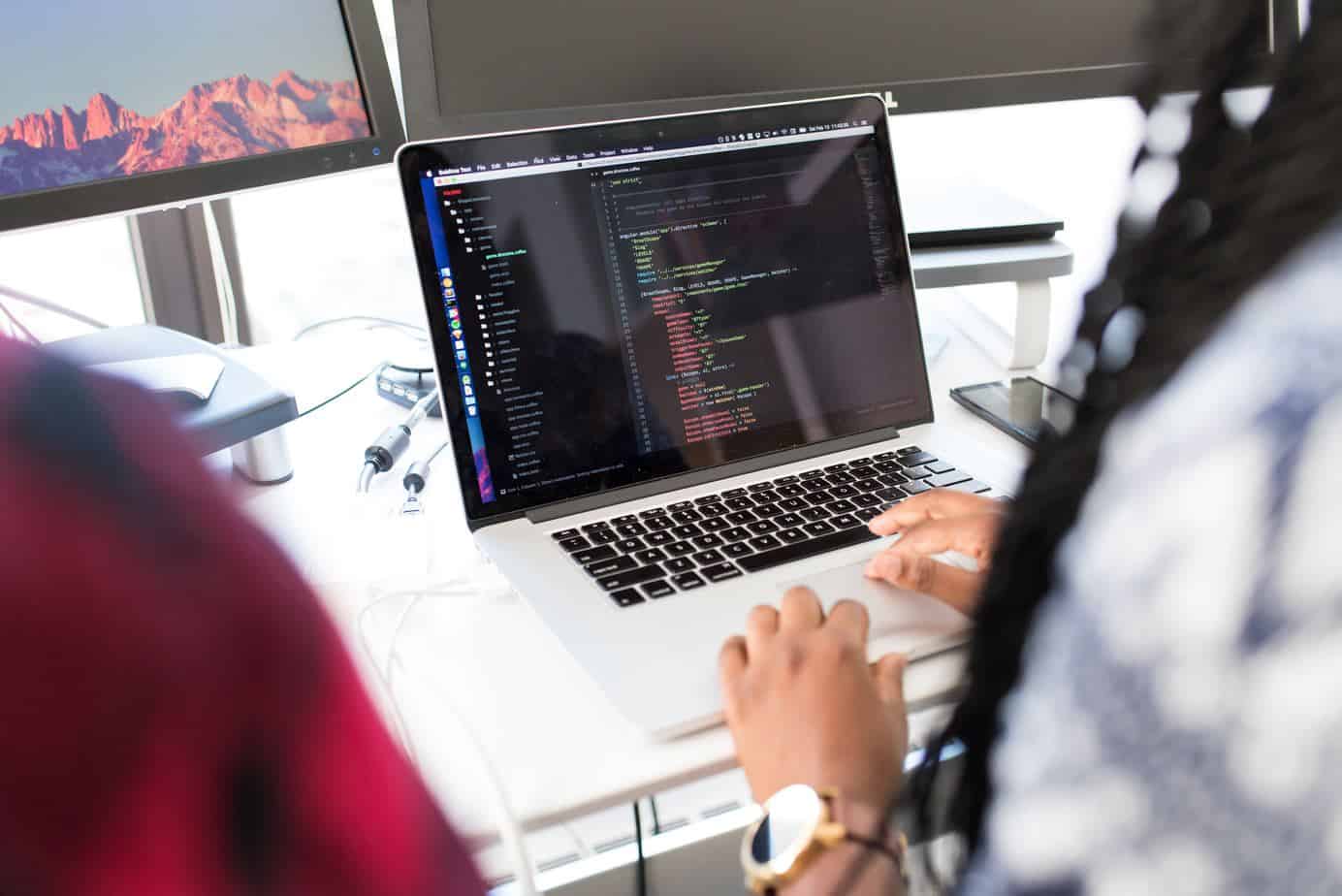 Woman becoming a Web Developer by coming on a laptop. Woman becoming a Web Developer by coming on a laptop.