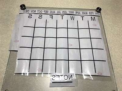 FREE SVG file and instructions cut out and sitting on backing paper ready to be transferred