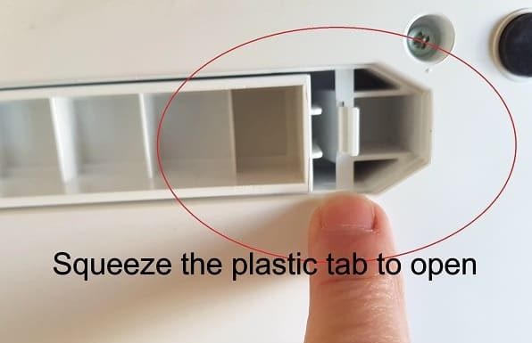 Scan N Cut Scanner glass cover to squeeze to open.