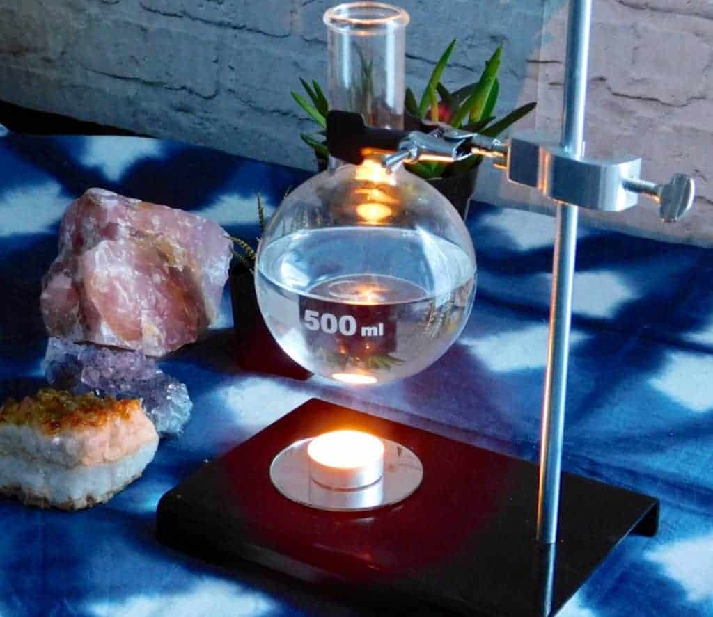 diy essentail oil warmer on table with crystals