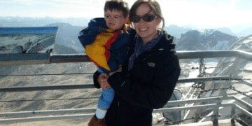Mom and toddler enjoying a mountaintop view.