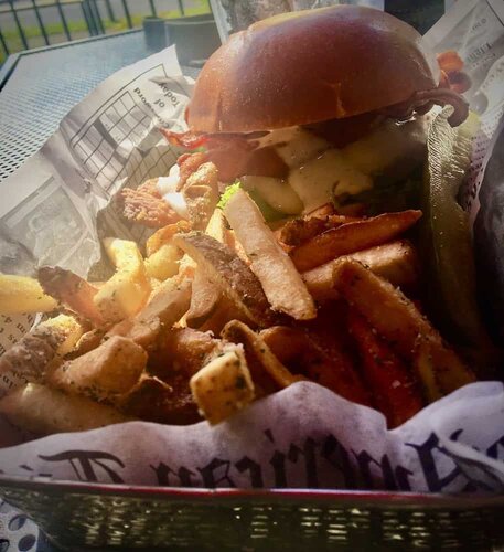 The bacon and ramch chicken sandwich with thick-cut french fries at clemson brothers in the hudson valley.