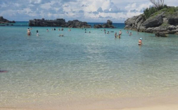 People swimming in well protected tobacco bay