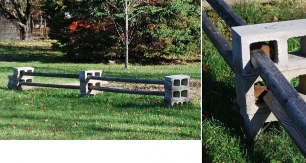 an example of way to arrange cinder block and wood to create a fence