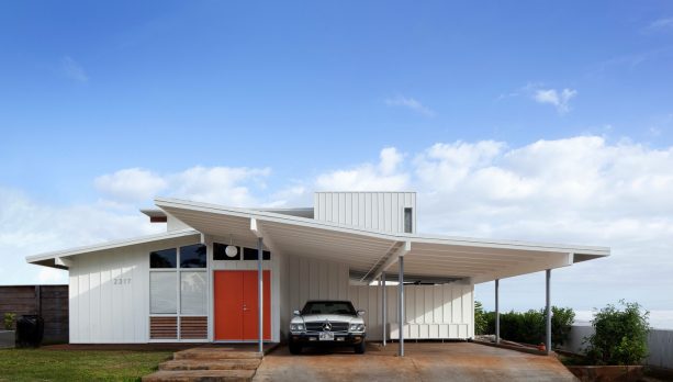 a coordinating look between a minimalist carport and a MIdcentury home exterior design