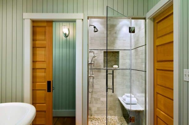 5-panel Douglas fir wood pocket door with white trim
