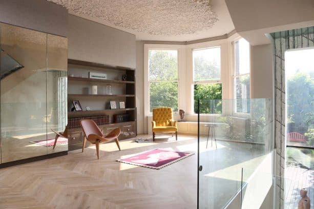 Windsor tan and yellow chairs in a contemporary living room