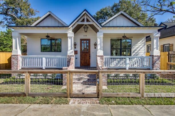 Shoji White SW 7042 paint color in a simple-looking modern farmhouse exterior