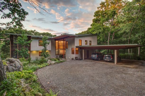 a carport for three cars in a contemporary exterior