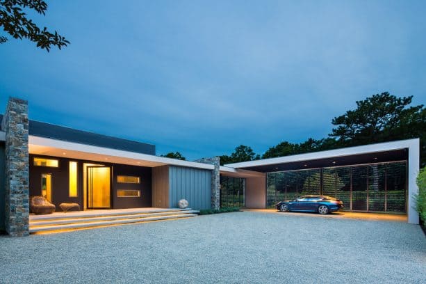 a modern carport with shutters at the back side