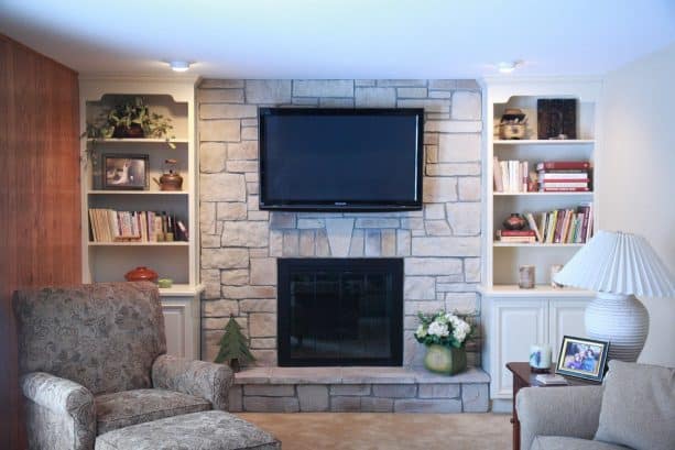 family room after being remodeled with new floor to ceiling fireplace design