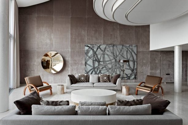 grey and brown living room with a wall from acoustic fabric panel