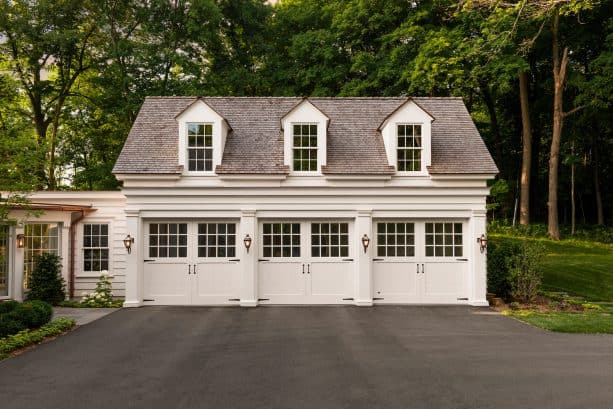 the 3-car garage connected with the covered walkway
