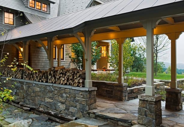 a closer look shows that the covered walkway is also functioned as wood storage at the same time