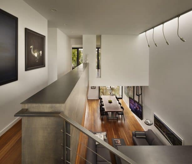 a half wall as a safety rail in a modern hall