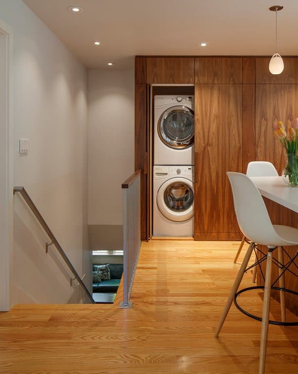 large flat-panel cabinet doors for laundry closet in a midcentury kitchen