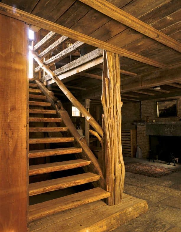 an open staircase from natural wood material