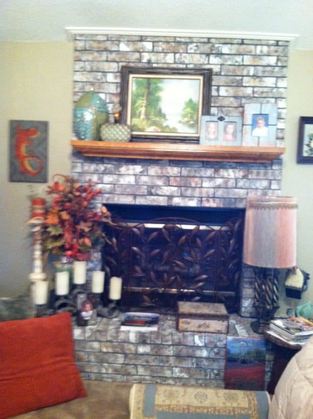 after makeover floor to ceiling grayish brick fireplace