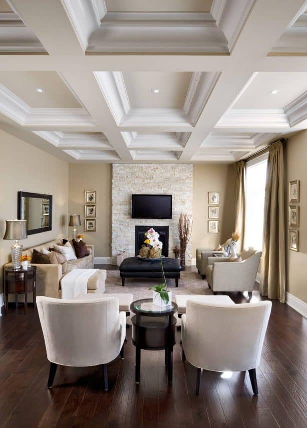 a traditional living room with tan and white color scheme