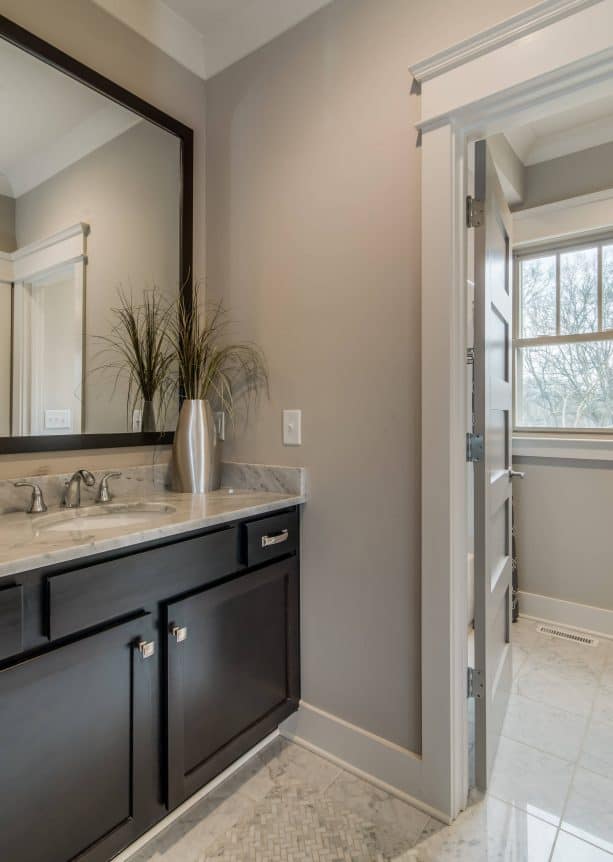 transitional bathroom with Sherwin-Williams colonnade gray SW 7641 warm gray wall paint color