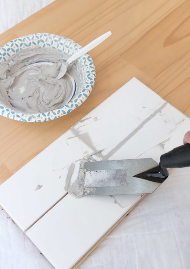creating sample to see the gray grout look on white subway tile